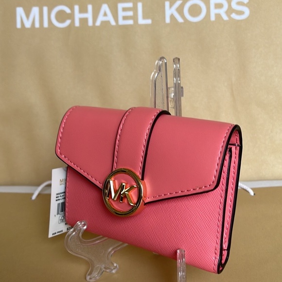 MICHAEL KORS CARMEN MEDIUM LOGO AND FAUX LEATHER WALLET GRAPEFRUIT - Picture 1 of 16